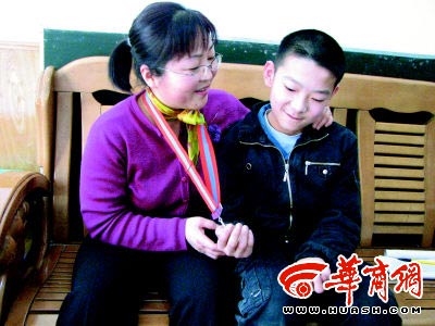 李晓宁:书写13年的母爱之歌-中国煤炭新闻网